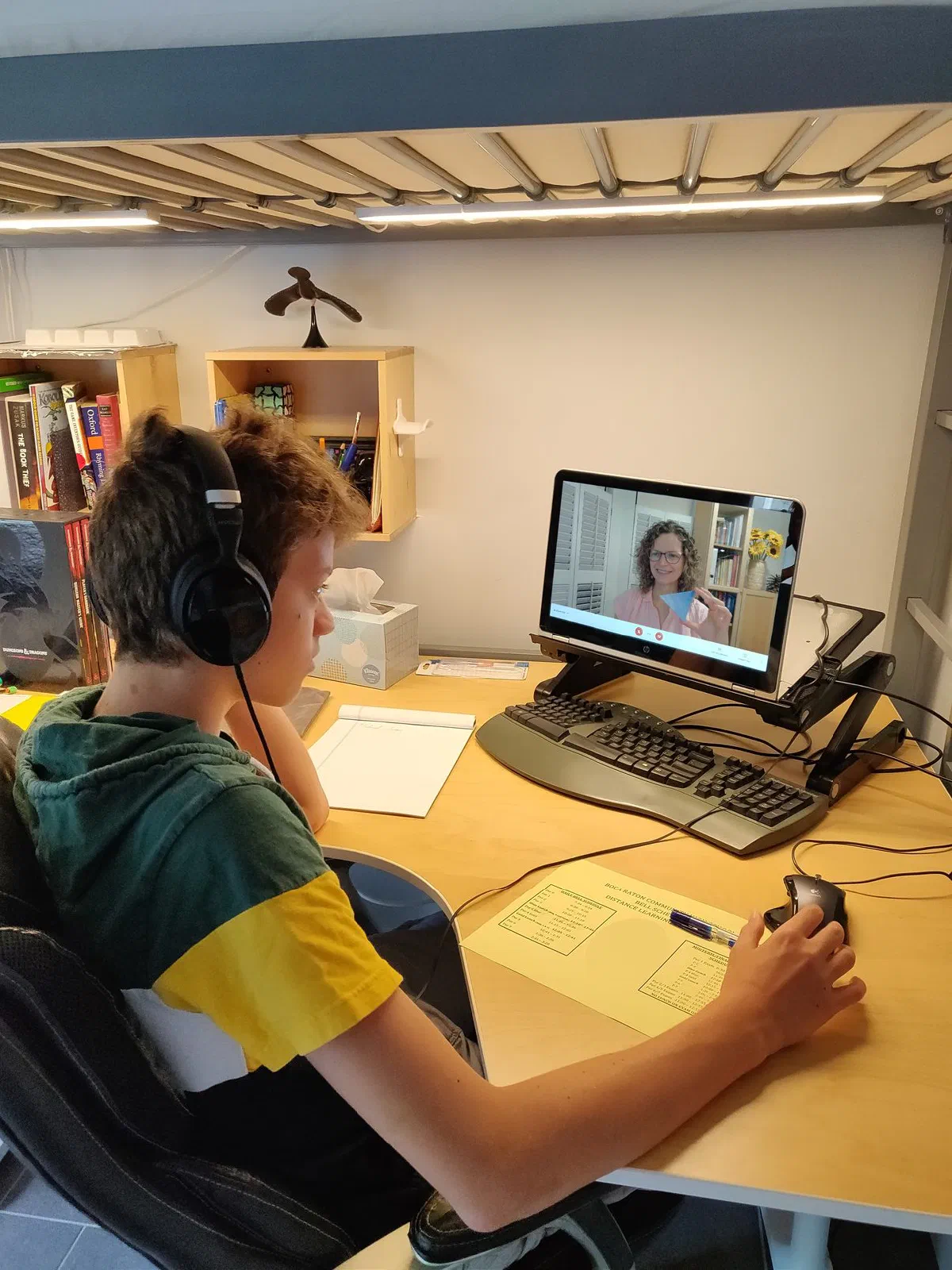 Student on video call with Olga